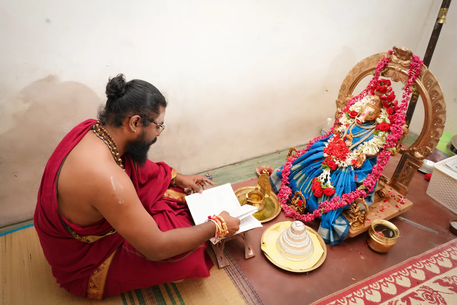 Arun Sharma Guruji performing a household puja