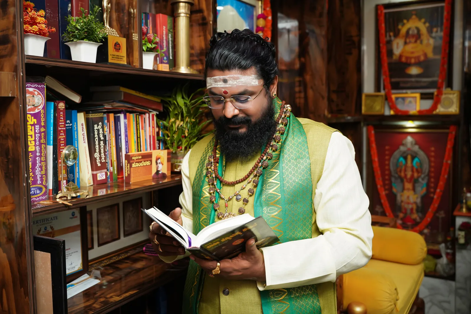 Arun Sharma Guruji studying a classical astrological text