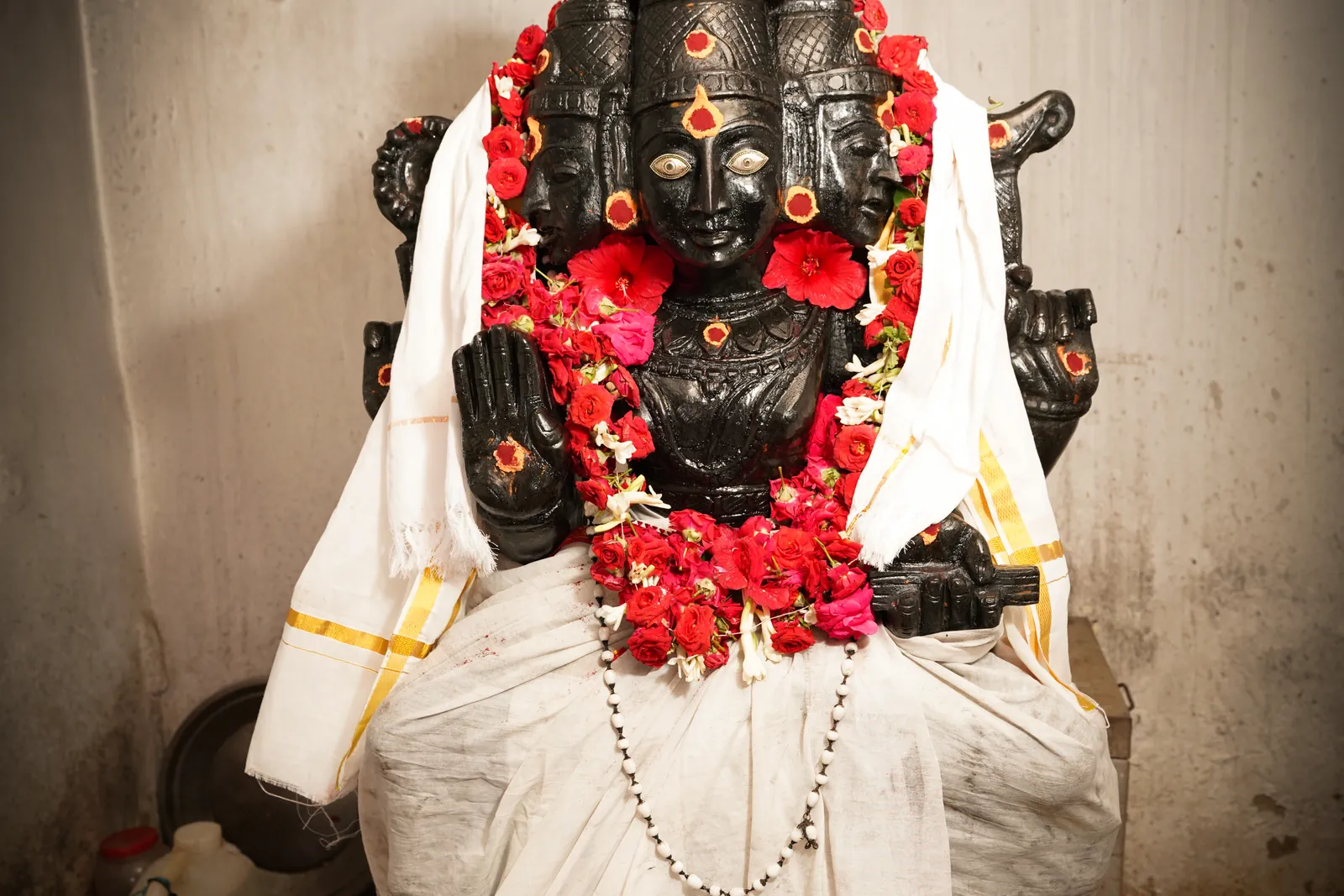 A garlanded deity at Sri Mookambika Jyothishyalaya
