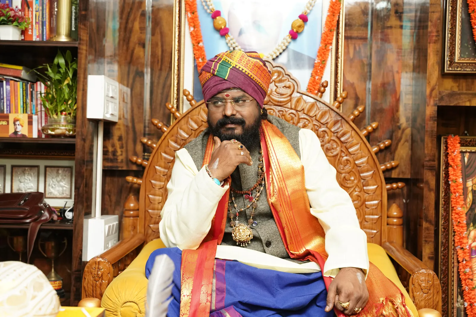 Arun Sharma Guruji seated in consultation
