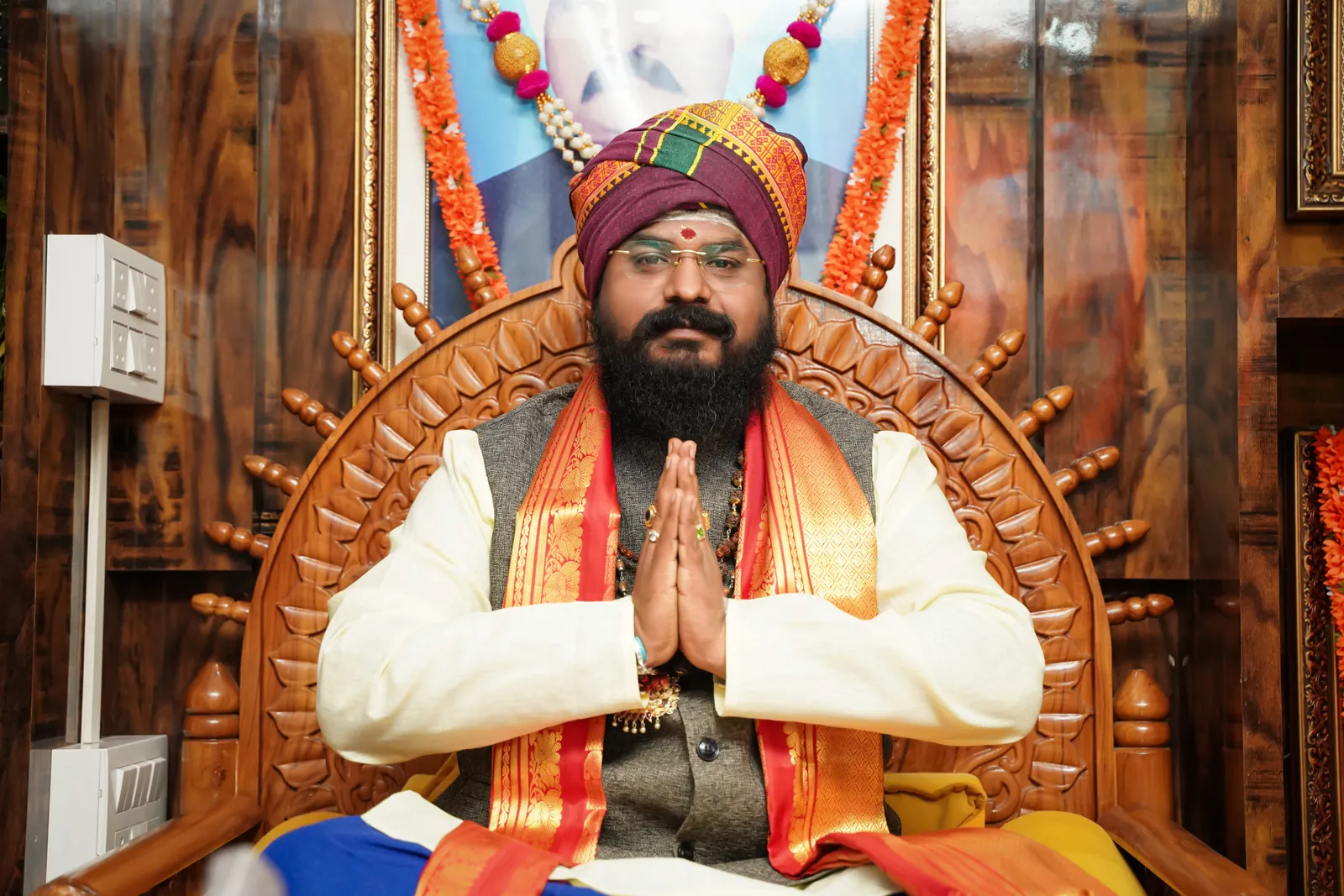 Arun Sharma Guruji offering a blessing at his Whitefield consultation room